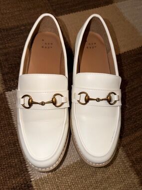 a new day White Loafers with Gold Bit Detail